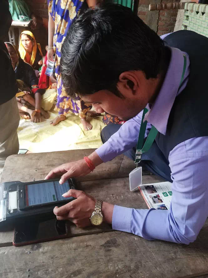 A staff member using the app during testing